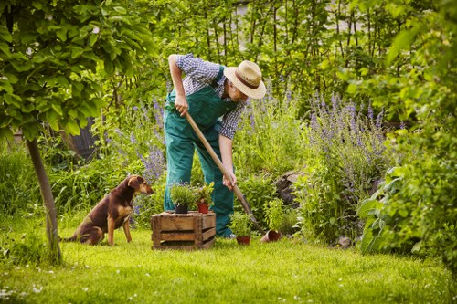 Professional gardeners reviewing booking details and site access
